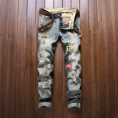 Slim straight-leg badge distressed jeans