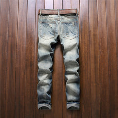 Slim straight-leg badge distressed jeans