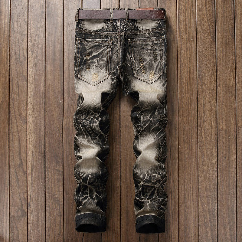 Embroidered wings ripped jeans