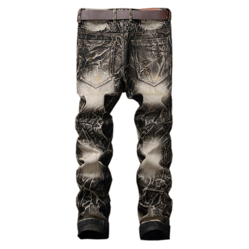 Embroidered wings ripped jeans