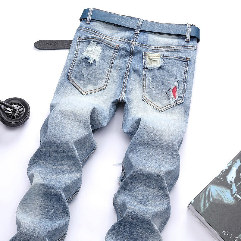 Light-colored stretch ripped jeans