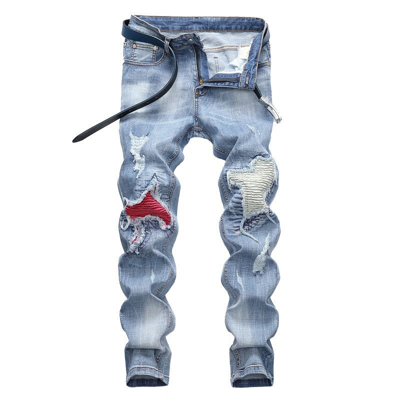 Light-colored stretch ripped jeans